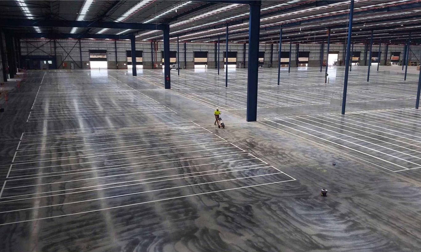 Creating lines in a warehouse where the shelves will be.